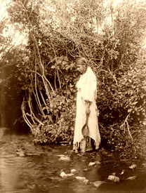 Arikara maiden at the water's edge, 1908