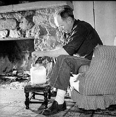 William Heck churning butter 1943