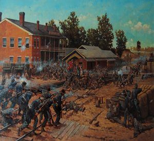 The Union Army taking control of the railroad crossing during the Siege of Corinth.