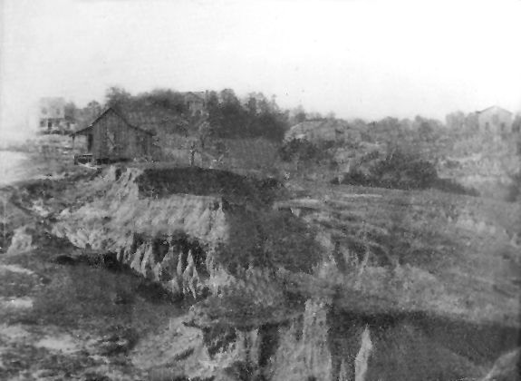 In this historic view of Rocky Springs, you can see several buildings in the background.