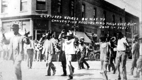 While the authorities detained a handful of white rioters, most black Tulsa<br />soon found themselves led away at gunpoint and held under guard. Photo courtesy Department of Special Collections, McFarlin Library, University of Tulsa.