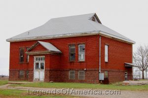 An old school sits quiet and abandoned in Big Springs by Kathy Alexander.