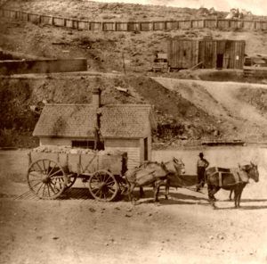 Weighing the load at the Gould & Curry Mine in Virginia City, Nevada, Lawrence & Houseworth, 1866.