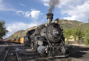 The Durango & Silverton Narrow Gauge Railroad is powered up and ready to leave the Durango, Colorado, station. Photo by Carol Highsmith.