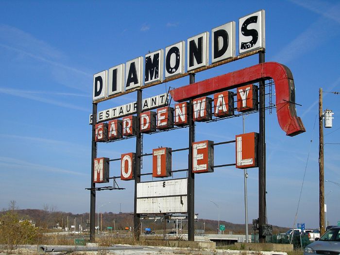 Large sign in Gray Summit, Missouri that advertised the Diamonds Restaurant and the Gardenway Motel by Kathy Alexander.
