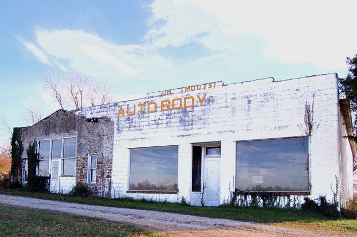 Jim Moot's Auto Body Shop is the only Route 66 era building left standing in Albatross, Missouri, by Kathy Alexander.