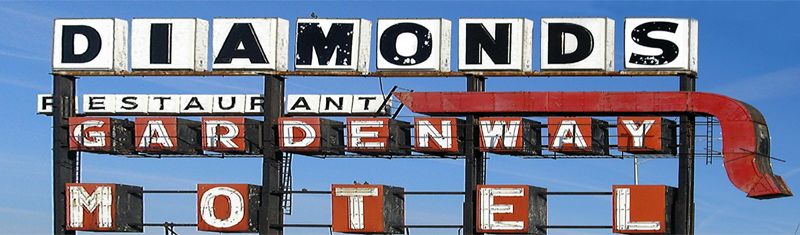 Large sign in Gray Summit, Missouri that advertised the Diamonds Restaurant and the Gardenway Motel by Kathy Alexander.