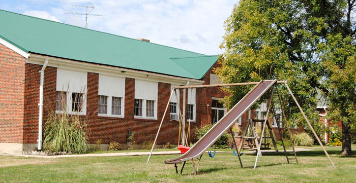 The former school building in Lock Springs, Missouri appears to be utilized as a residence today by Kathy Alexander.