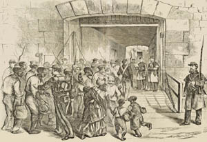 Runaway slaves arrive at Fort Monroe, Virginia.