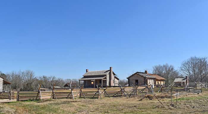 Reconstructed cabins at the San Felipe, Texas Historic Site by Kathy Alexander.