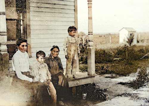 Dr. Susan LaFlesche Picotte with her mother and two sons at their Nebraska Home. 