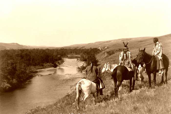 Piegan Indians and horses, by Edward S. Curtis, 1910