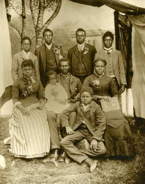 Former slave Nancy Gooch bought her son, Andrew Monroe, seated with a child on his lap at the center, and his family out of slavery and brought them to her farm in Coloma. Photo courtesy of the El Dorado County Historical Museum