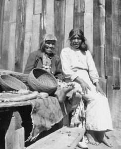 Chukchansi Yokuts women grinding acorns by the Bureau of Indian Affairs.