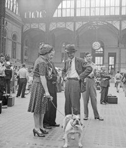 Travelers at Penn Station in New York City by Marjorie Collins, 1942.