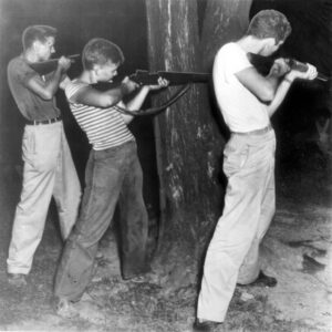 Servicemen firing at jail in Aspen, Tennessee, 1946.