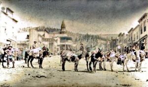 Pack burros on Victor Avenue, Victor, Colorado about 1900