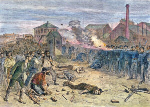 Troops open fire on rioters in Chicago, Illinois in July 1877.